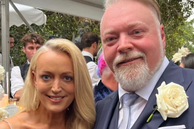 Jackie Henderson and her Kyle & Jackie O radio co-star Kyle Sandilands pose together at his wedding 