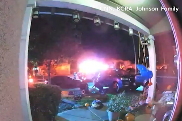 Woman gives birth on front lawn after contractions come one week early.