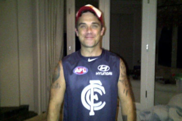 Robbie Williams in a Blues jumper in 2012.