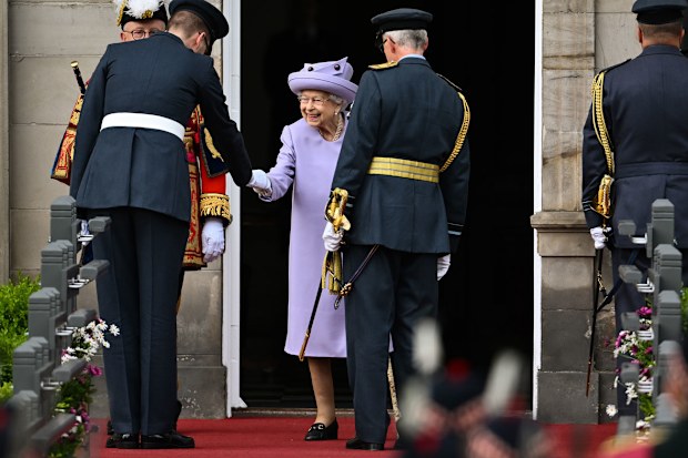  Queen Elizabeth II attends an Armed Forces Act of Loyalty Parade at the Palace of Holyroodhouse on June 28, 2022 in Edinburgh, United Kingdom