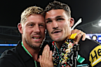 Australian pro surfer Mick Fanning celebrates with Nathan Cleary after the Panthers claimed the 2023 NRL premiership.