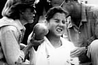Monica Seles is treated after being stabbed in a match in Hamburg in 1993.