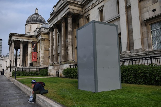 A protective barrier is seen around the statue of George Washington in Trafalgar Square in anticipation of protests today on June 12, 2020 in London, England