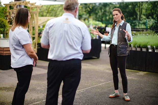 Catherine, Duchess of Cambridge talks to Martin and Jennie Turner, owners of the Fakenham Garden Centre in Norfolk, during her first public engagement since lockdown, on June 18, 2020 in Fakenham, United Kingdom