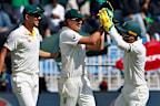 Josh Hazlewood (left), Pat Cummins (centre) and Alex Carey on day one of the first men's Test between Pakistan and Australia.
