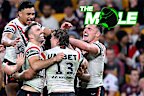 Sydney Roosters players celebrate against the Broncos.