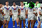 Canterbury Bulldogs players gather behind their try line after conceding a try to the Sharks in round 16.