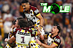 Brisbane Broncos players celebrate a try against the Cowboys.