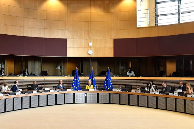 European Commission President Ursula von der Leyen, center, chairs a meeting of the College of Commissioners at EU headquarters in Brussels, Friday, June 17, 2022. 
