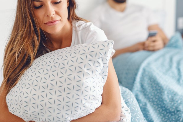 Woman and man in bed