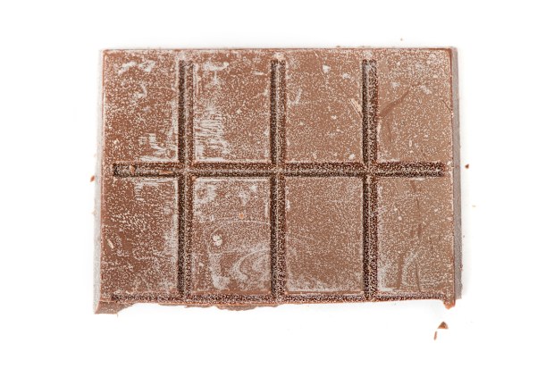 Close up of chocolate bar isolated on white background