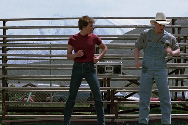 Kevin Bacon and Chris Penn in Footloose (1984).