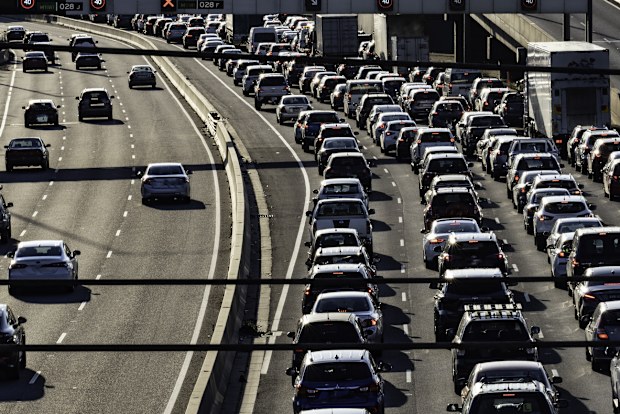 Melbourne's Westgate freeway at dusk, people driving home