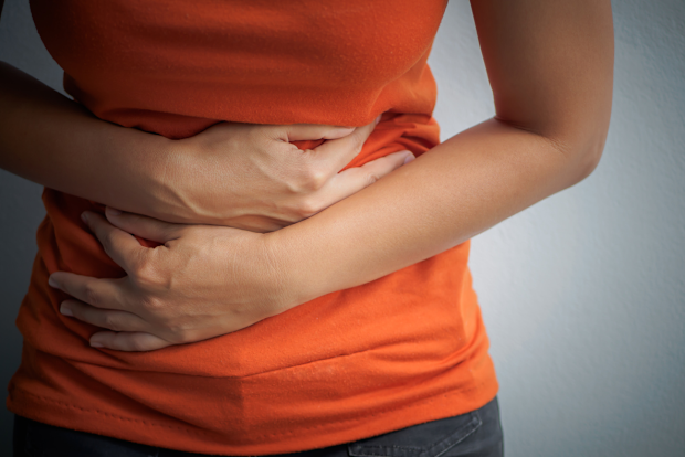 Woman with gastro / stomach pains