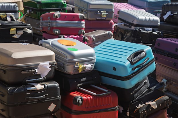 lost and found luggage suitcases and bags, travel insurance on lost luggage suitcase and bags, during air travel lots of baggage is lost, complaints and liability