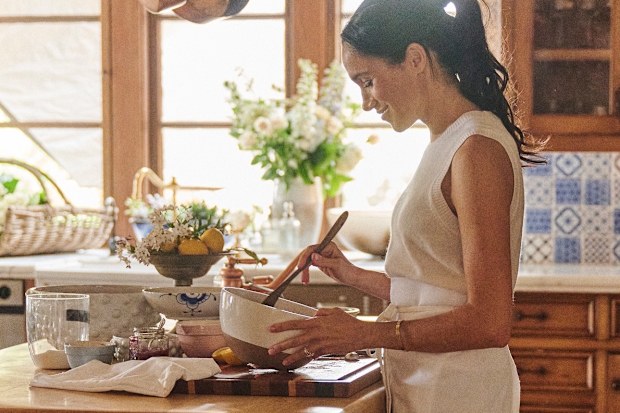 Meghan, the Duchess of Sussex, in her Montecito kitchen for a promotional image for her brand As ever, May 2025.