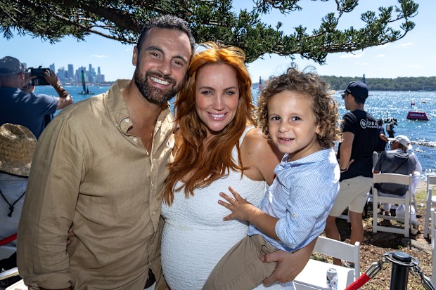 Cameron Merchant and Jules Robinson with their son Ollie