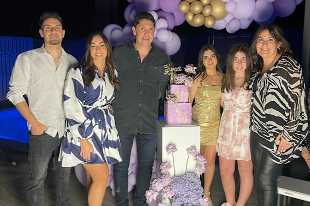Maria happy and healthy with her family.