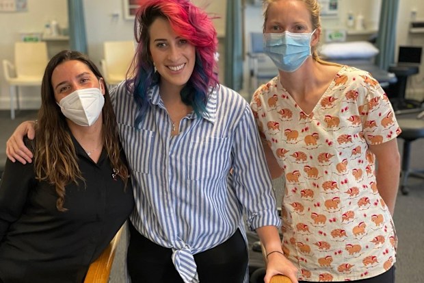 Lucy Wolfman poses with medical staff.