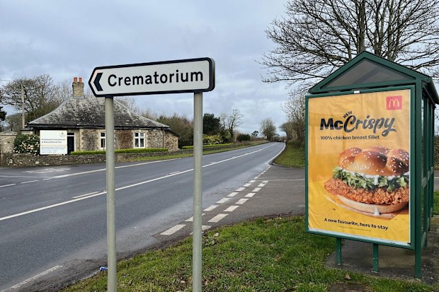 McDonald's McCrispy sign placed next to crematorium.