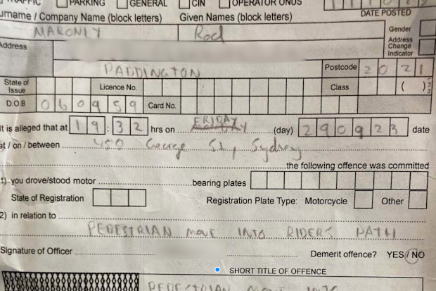 Rod Maroney was fined while in hospital after being hit by an e-bike.