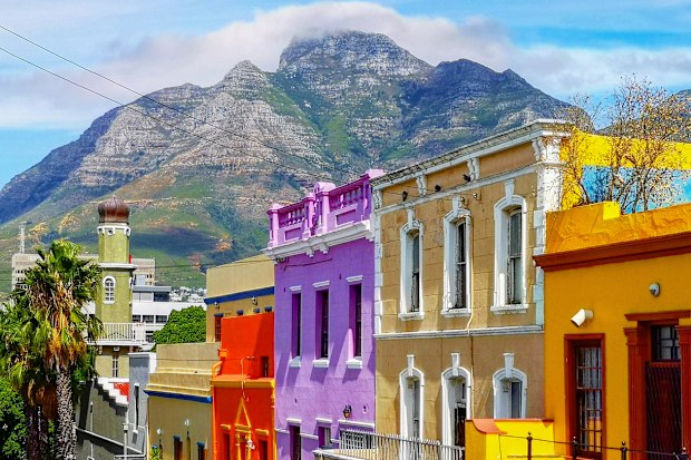 Cape town Bo Kaap Malay quarter rooftops with table mountain in the background, featuring the typical colorful houses.