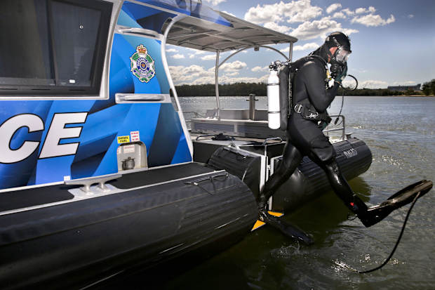 A search and rescue operation is under way after a boat capsize on the Queensland coast