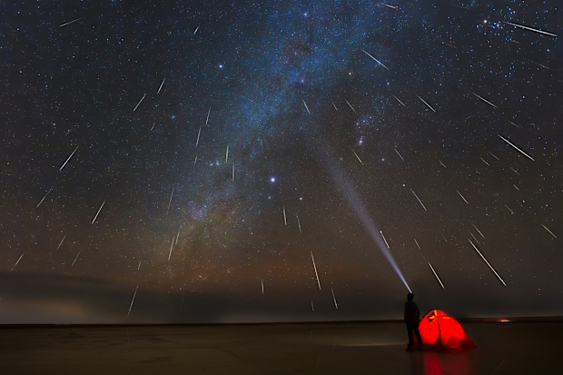 Geminids meteor shower in 2018 over lake in Erenhot, Inner Mongolia, China.