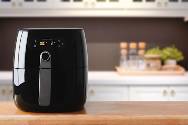 Air fryer machine in kitchen.