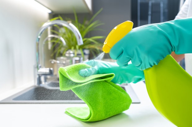 Wiping the kitchen bench