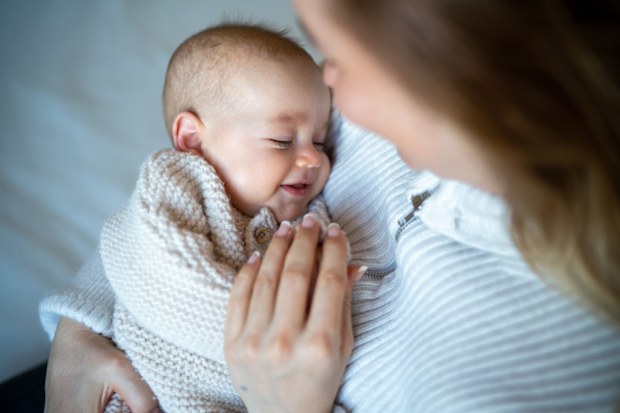 Mum holding new baby