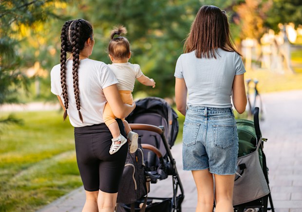 Two mums out together with their kids. 