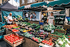 Broadway Market, Hackney, London - 29th July 2023: Organic vegetable stall at Broadway Market in Hackney, London