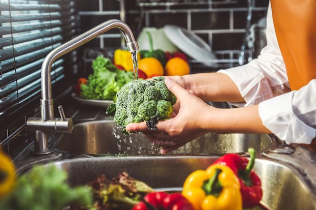 Washing veggies stock