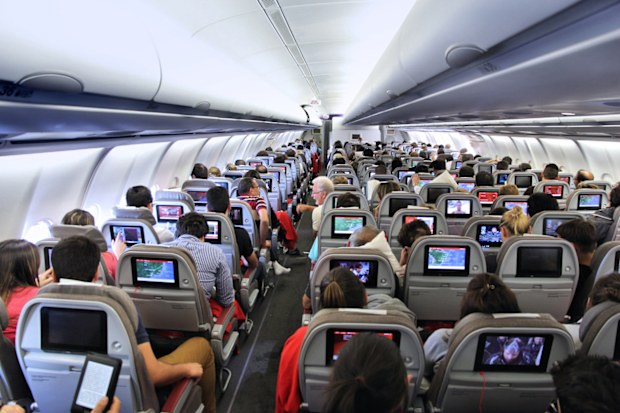 Try to sit in the middle of the plane. 