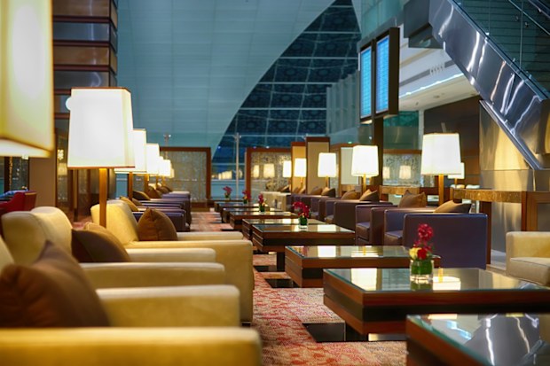 DUBAI, UAE - APRIL 07, 2013: airport interior. Dubai International Airport is a major international airport located in Dubai, and is the world's busiest airport by international passenger traffic. It is a major airline hub in the Middle East, and is the main airport of Dubai.