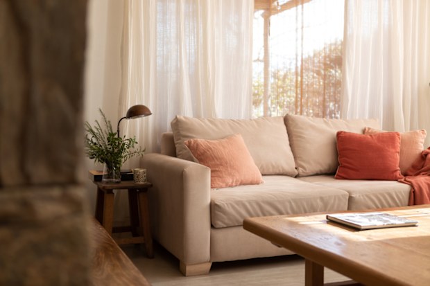 Beautiful living-room decorated in palette of pastel colours 