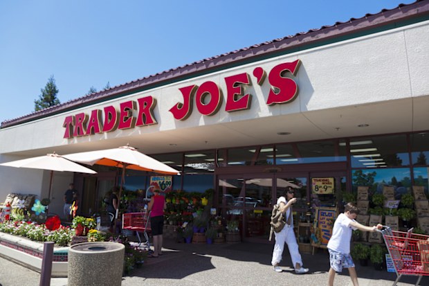 Fair Oaks, California, USA - July 23, 2011: Shoppers going in and out of Trader Joe&amp;rsquo;s grocery store on a sunny summer day. Trader Joe&amp;rsquo;s is a privately held chain of specialty grocery stores .The first Trader Joe&amp;rsquo;s store opened in Pasadena, California in 1967 and today there are over 360 stores in 29 states.