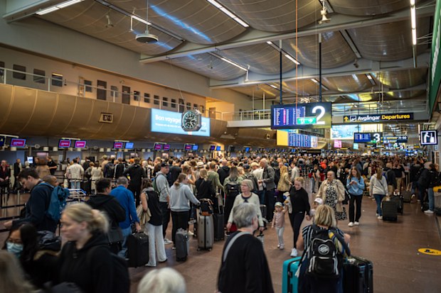 Stockholm, Sweden June 3, 2022 Passengers in the departure hall of Arlanda airport.