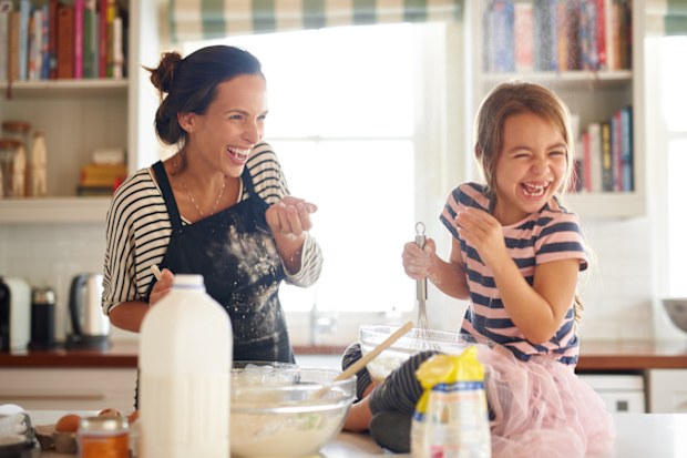 kids cooking with parent in kitchen