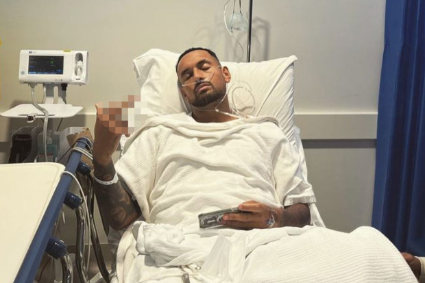 Nick Kyrgios posts a photo from his hospital bed following knee surgery.