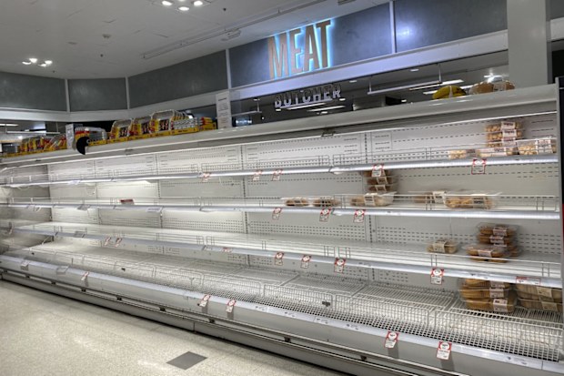 Empty supermarket shelves at Coles