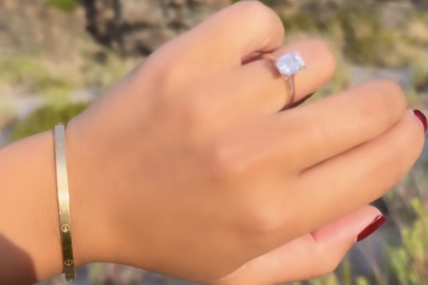The moment AFL star Jeremy Cameron proposes to partner Indiana Putra