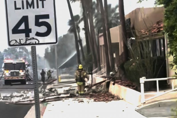 This image provided by Nima Tabrizi shows firefighters at the scene of an explosion at Palm Springs, Calif., on Saturday