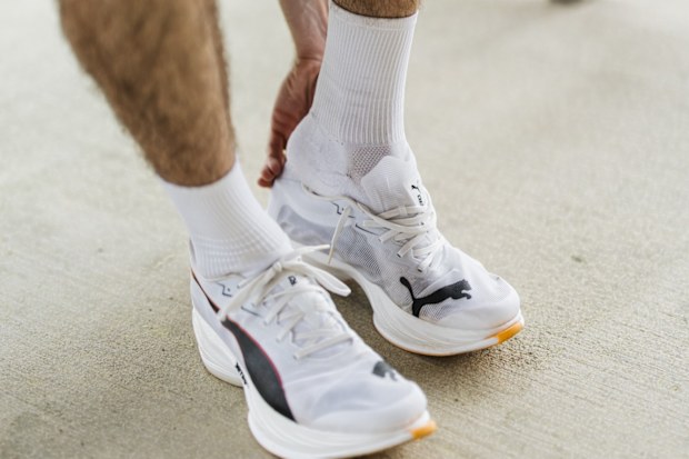 Australia's Patrick Tiernan slipping into his Puma Fast-R Nitro Elite 3 during the lead-up to the 2025 Boston Marathon.