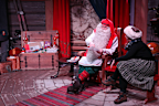 Santa Claus sits in his chamber at the Santa Claus Village, in Rovaniemi, Finland, also the official hometown of Santa Claus.