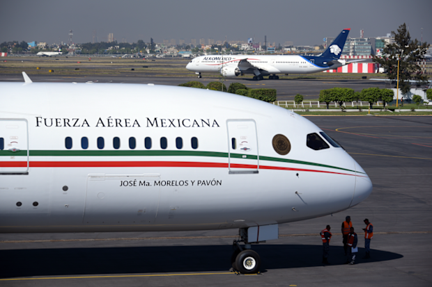 Pictured: the presidential airplane at the presidential hangar at Benito Juarez International Airport in Mexico City. 