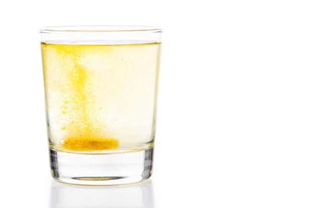 A B vitamin tablet in glass of water similar to Berocca