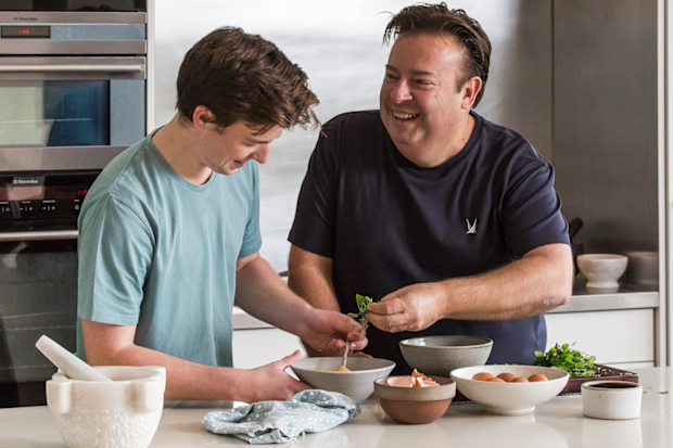 Chef Peter Gilmore cooking with his son