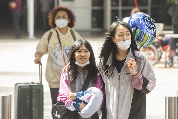 Flights from China continue to arrive at Sydney International Airport.